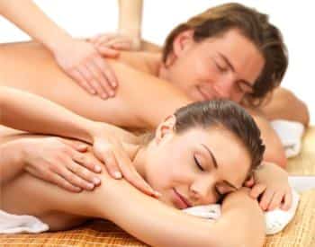 Man and woman enjoying massages